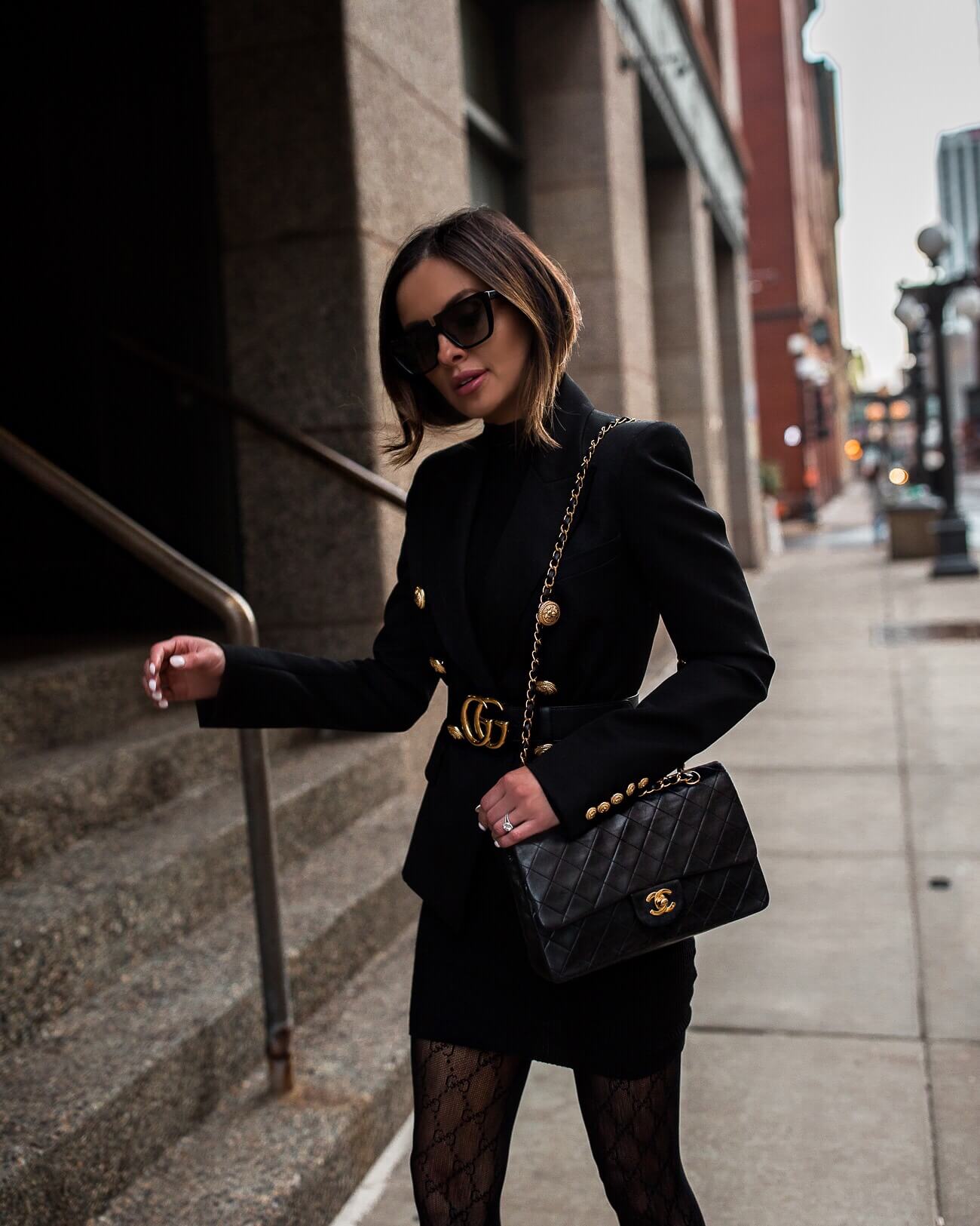 fashion blogger mia mia mine wearing a balmain blazer and a gucci