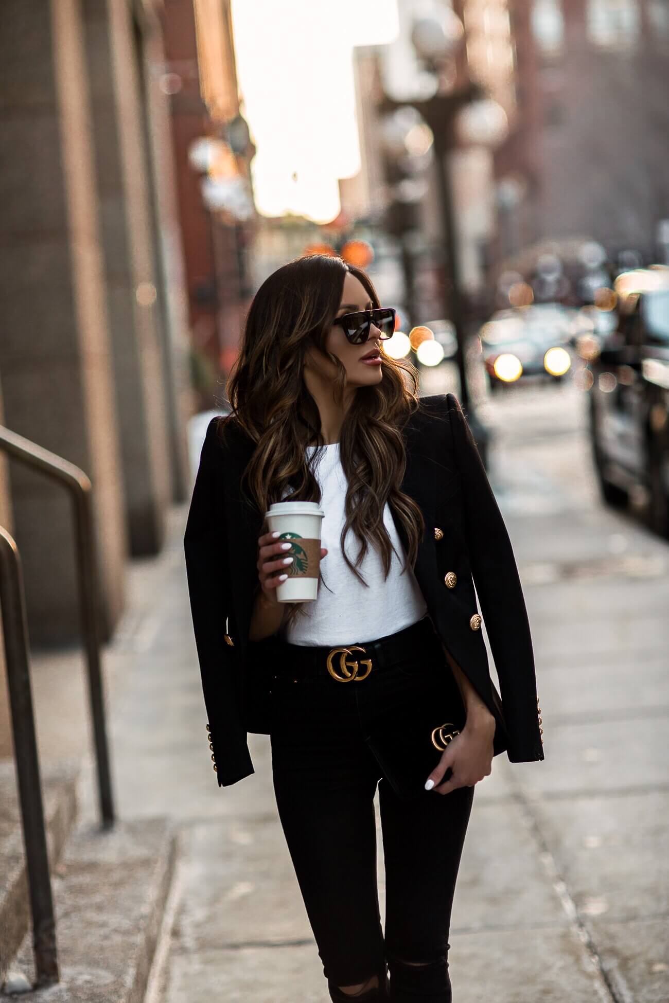 fashion blogger mia mia mine wearing a white tee and a balmain blazer for spring