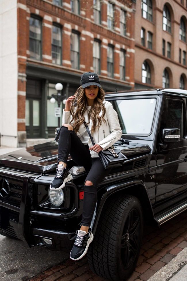 fashion blogger mia mia mine wearing adidas nite jogger sneakers from finish line