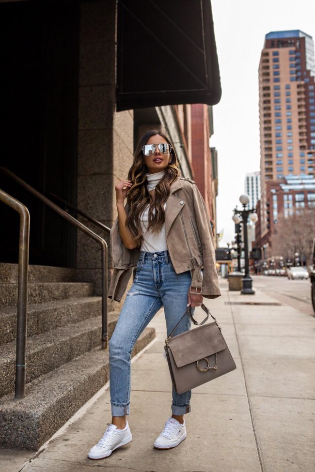 fashion blogger mia mia mine wearing reebok club c 85 sneakers and levi's denim