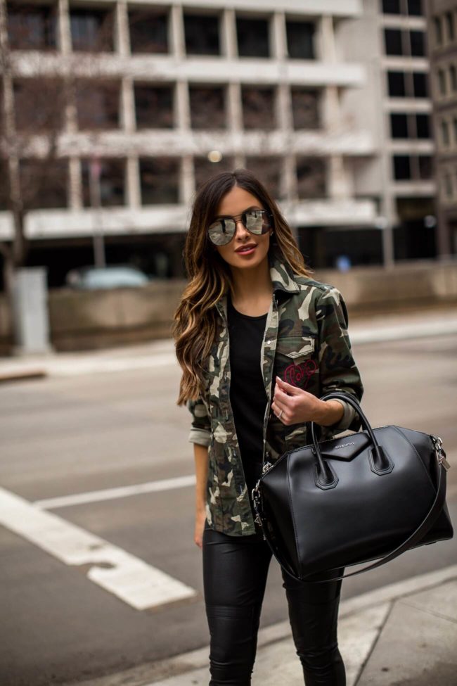 fashion blogger mia mia mine wearing a camo jacket from walmart