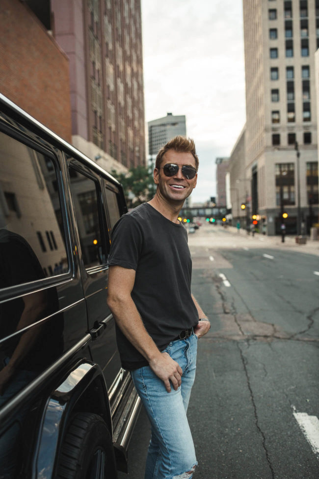 fashion blogger mia mia mine's husband phil thompson wearing a gray ksubi tee from the nordstrom anniversary sale 2019
