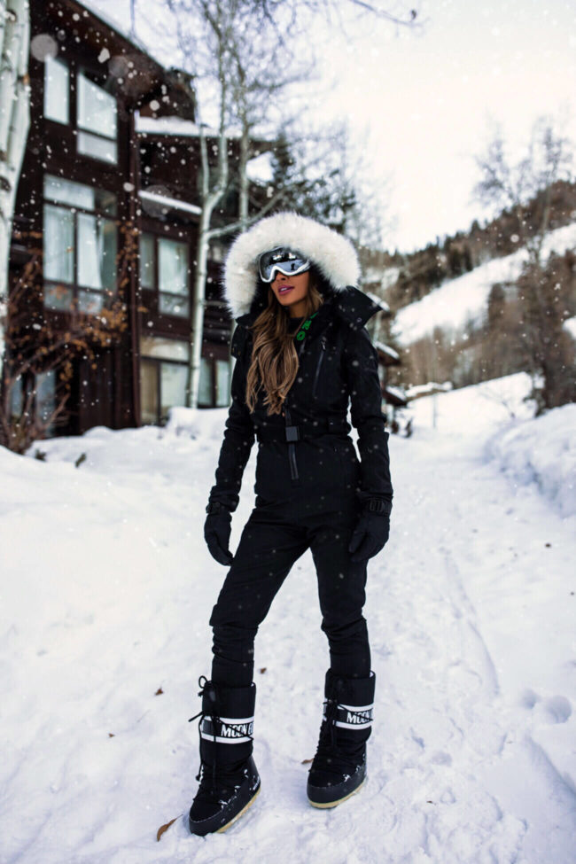 mia mia mine wearing a topshop ski suit from nordstrom