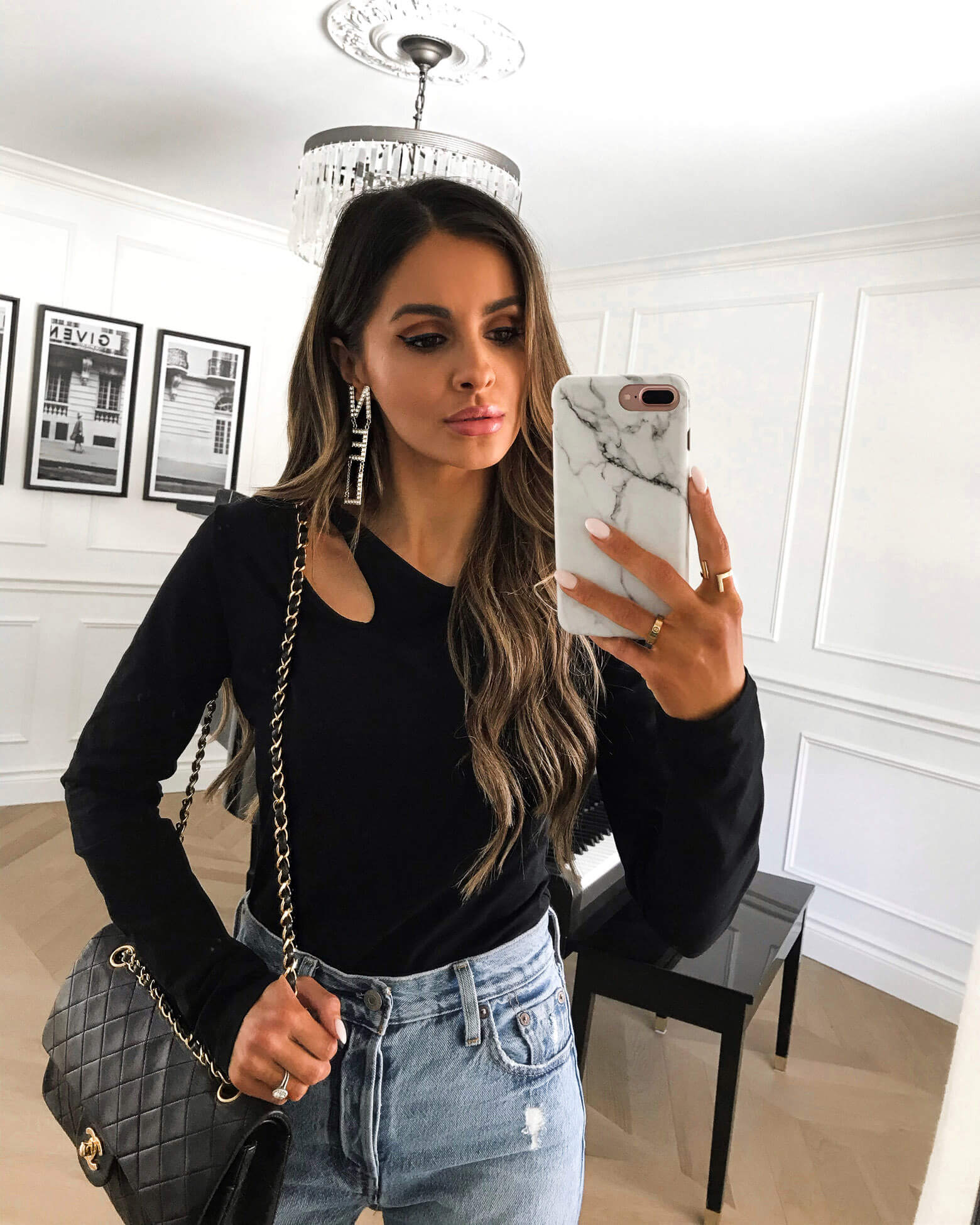 fashion blogger mia mia mine wearing black cut out top from amazon