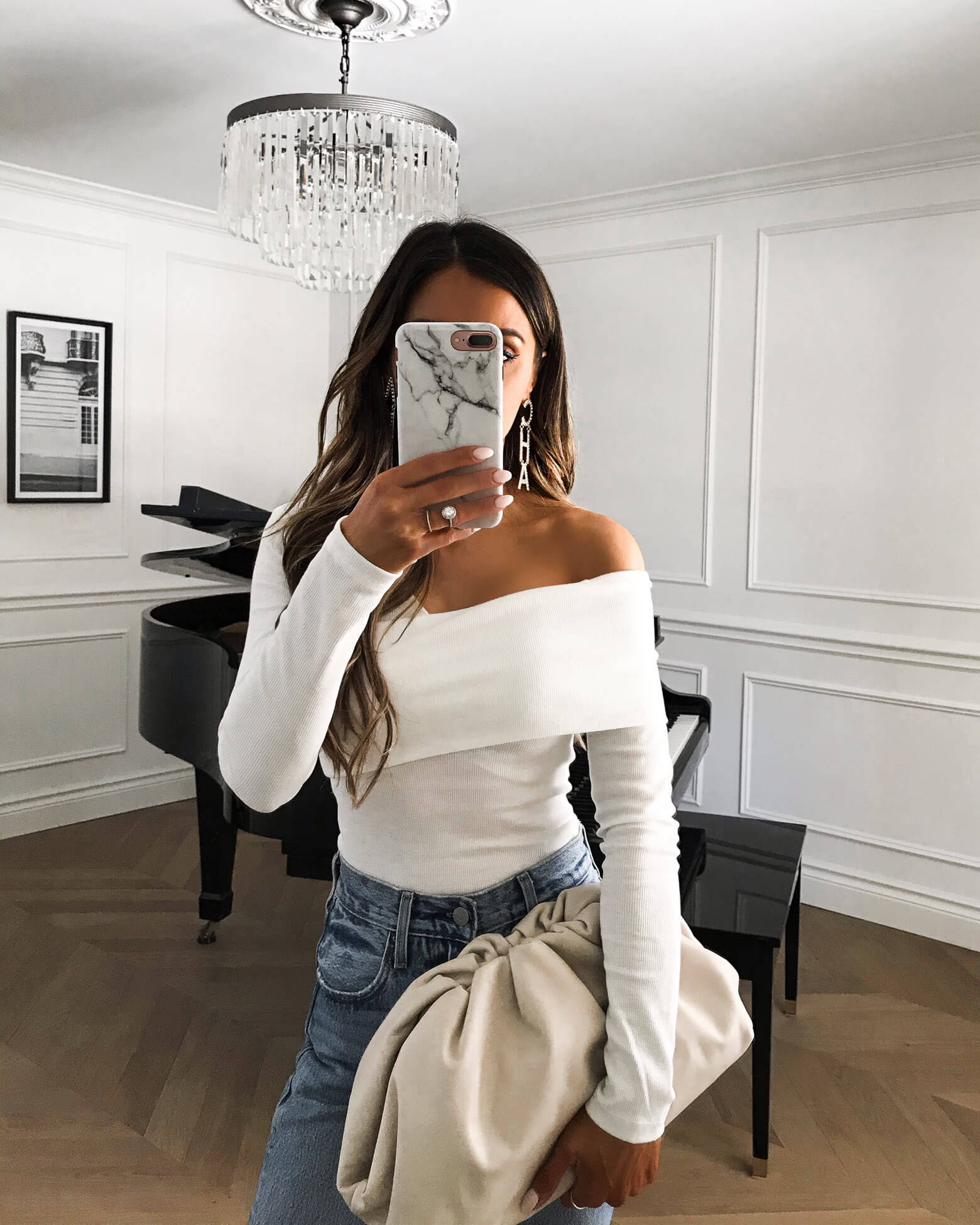 fashion blogger mia mia mine wearing a white off shoulder bodysuit from amazon