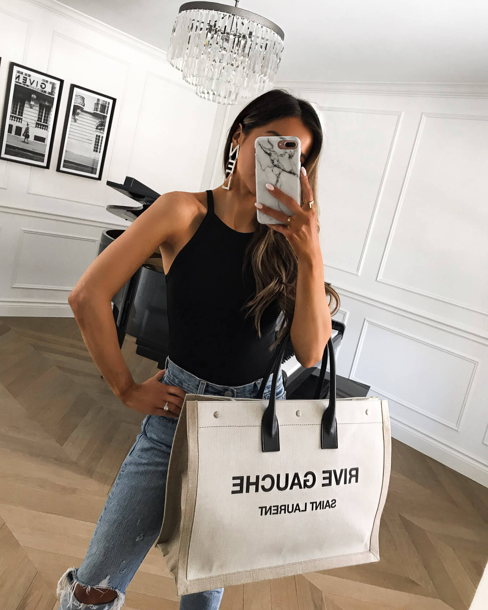 fashion blogger mia mia mine wearing a black bodysuit from amazon