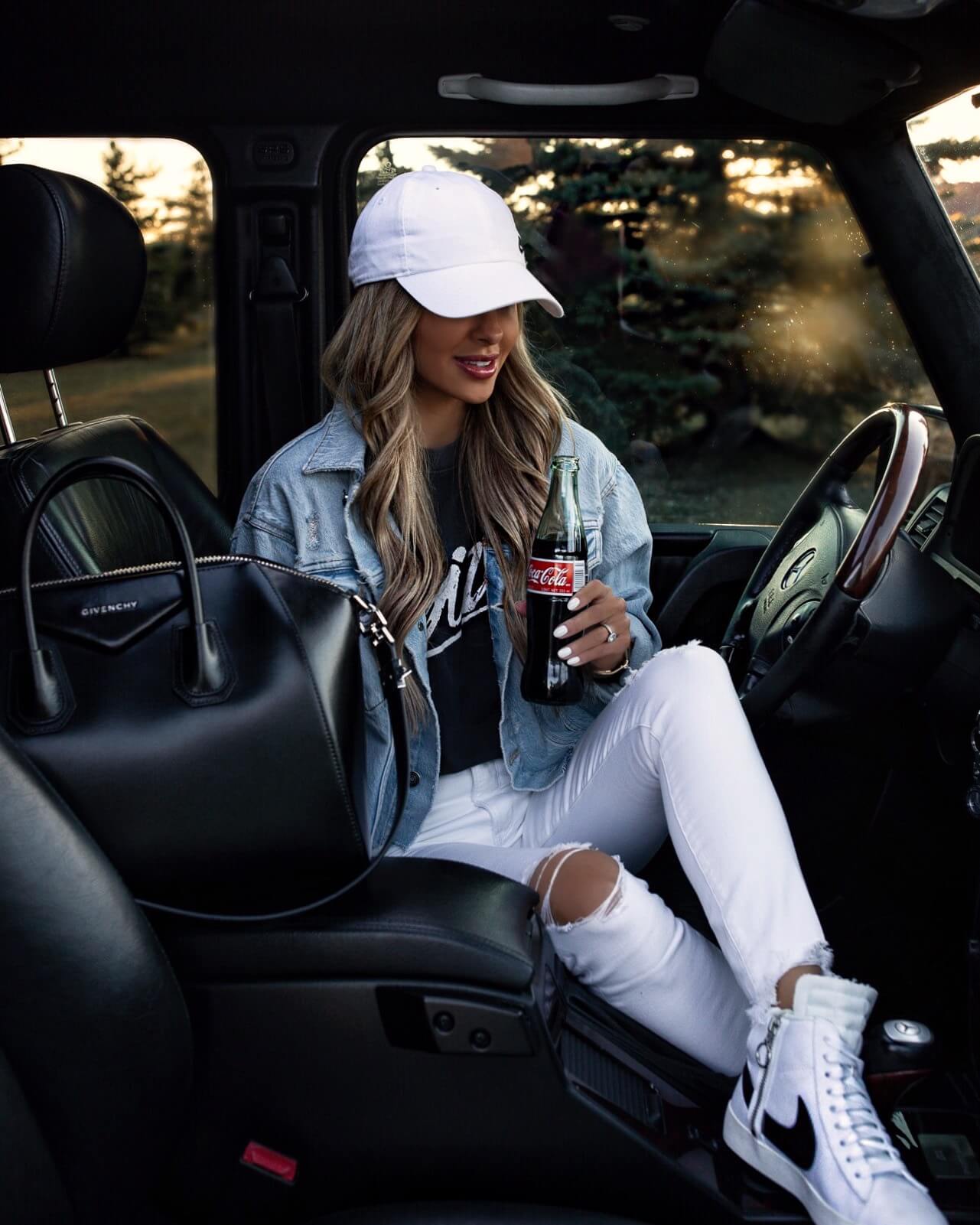 fashion blogger mia mia mine wearing a denim jacket and anine bing tee