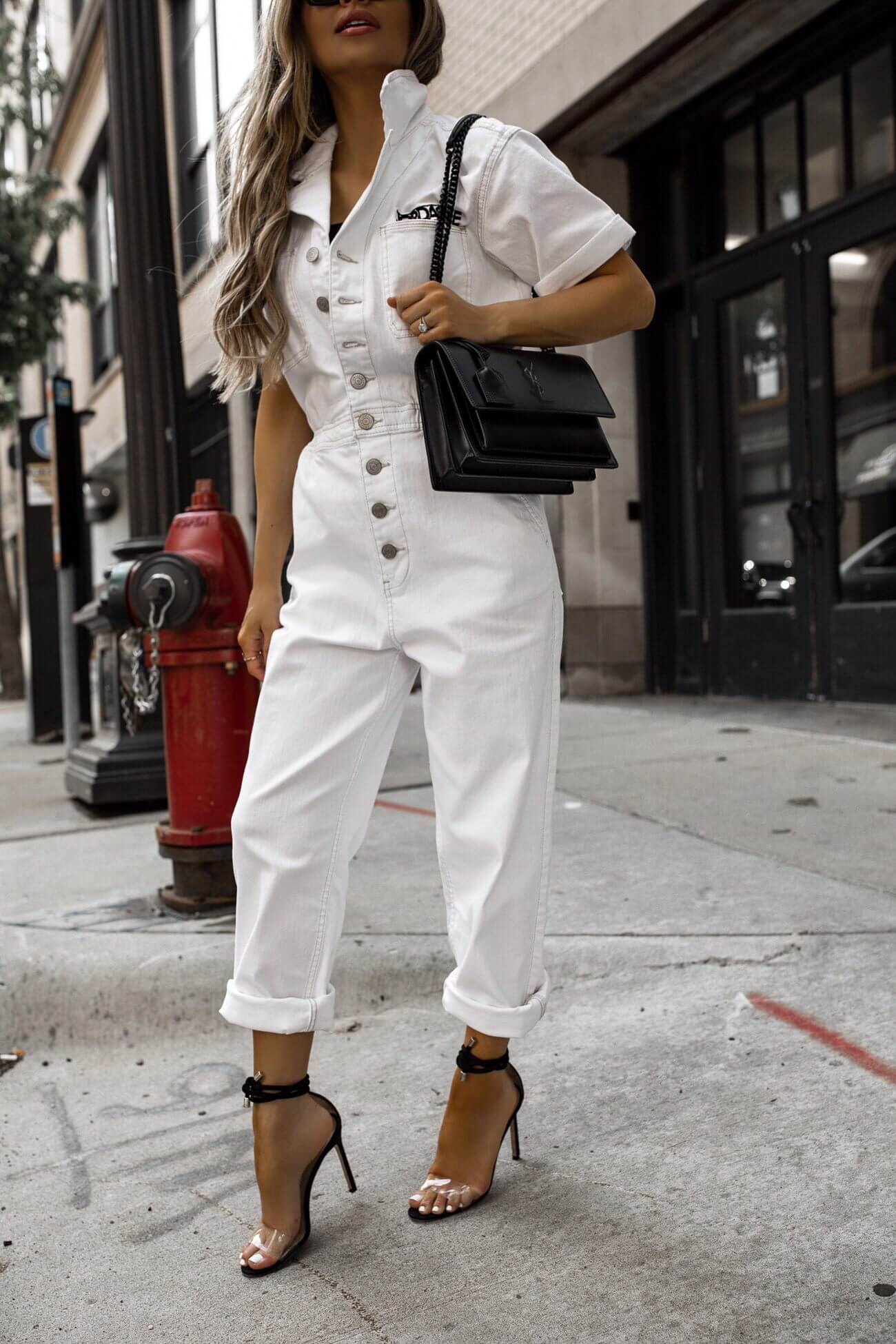 fashion blogger wearing a white jumpsuit for summer
