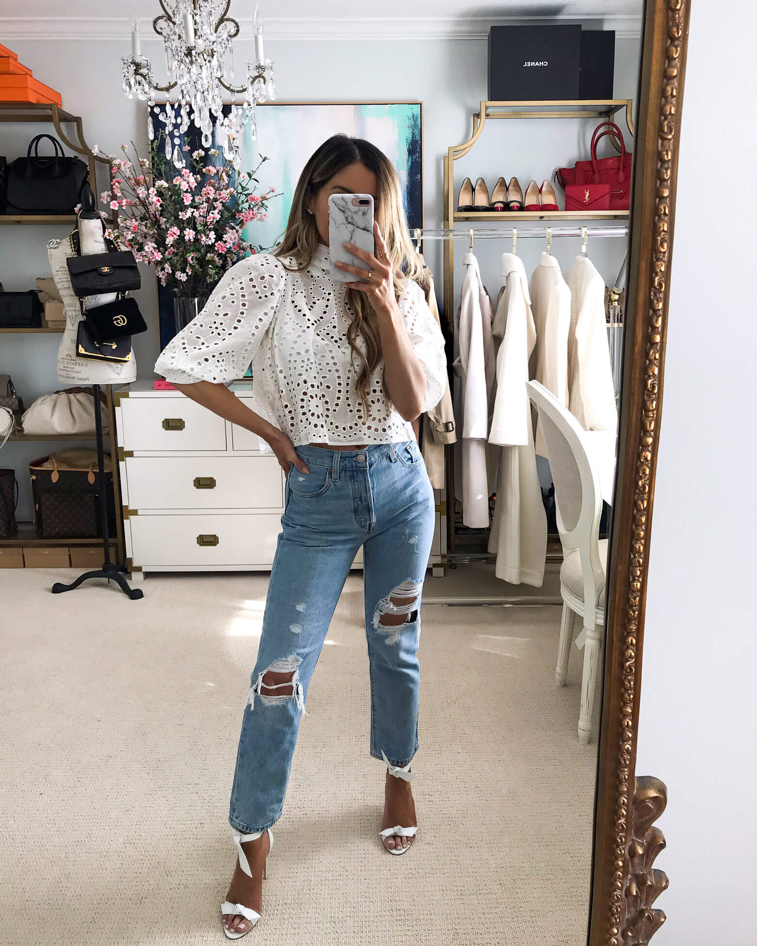 fashion blogger mia mia mine wearing an eyelet top from revolve