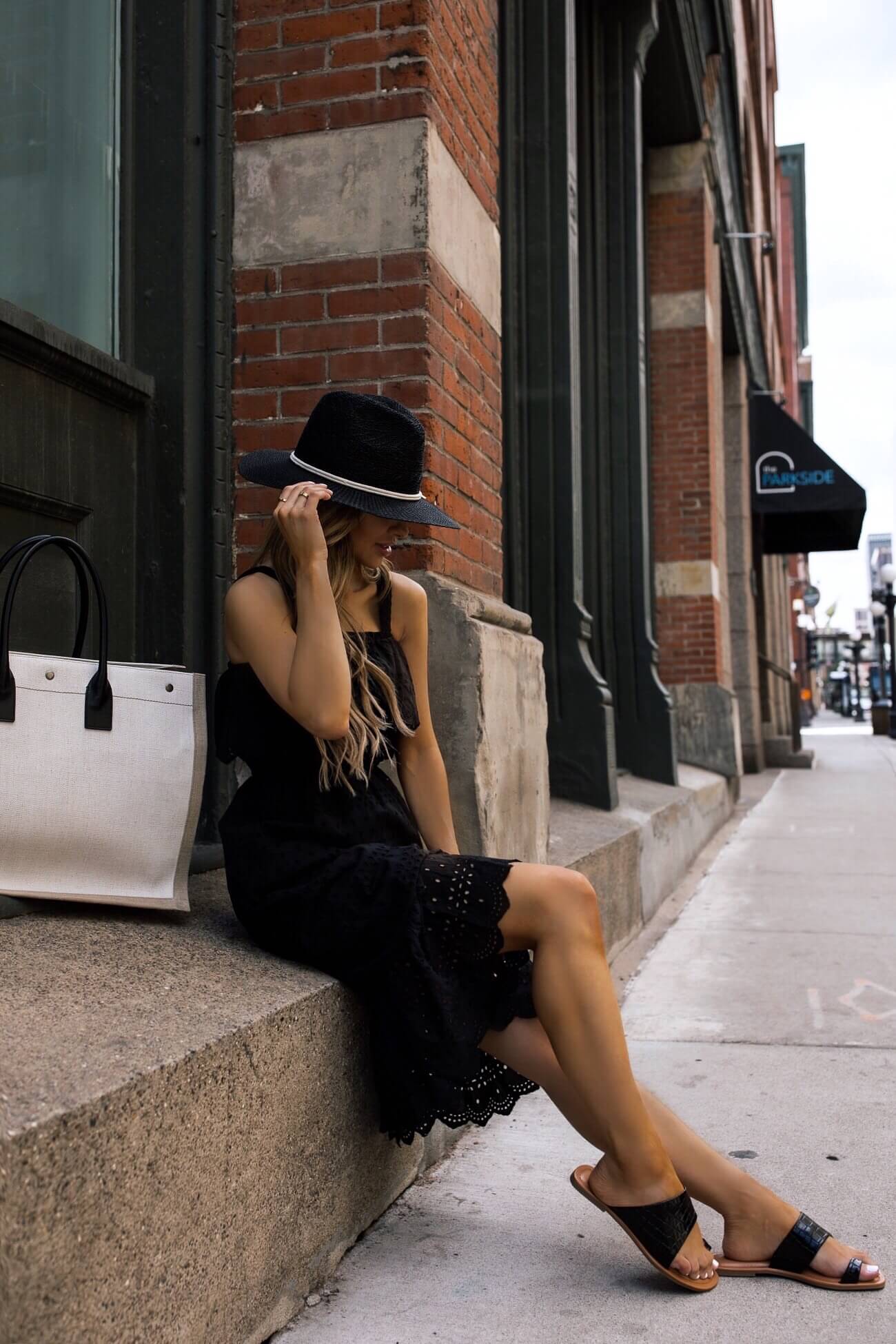 fashion blogger mia mia mine wearing a black dress from walmart for summer