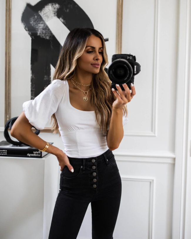 fashion blogger mia mia mine wearing a white top from abercrombie on sale for ltk day