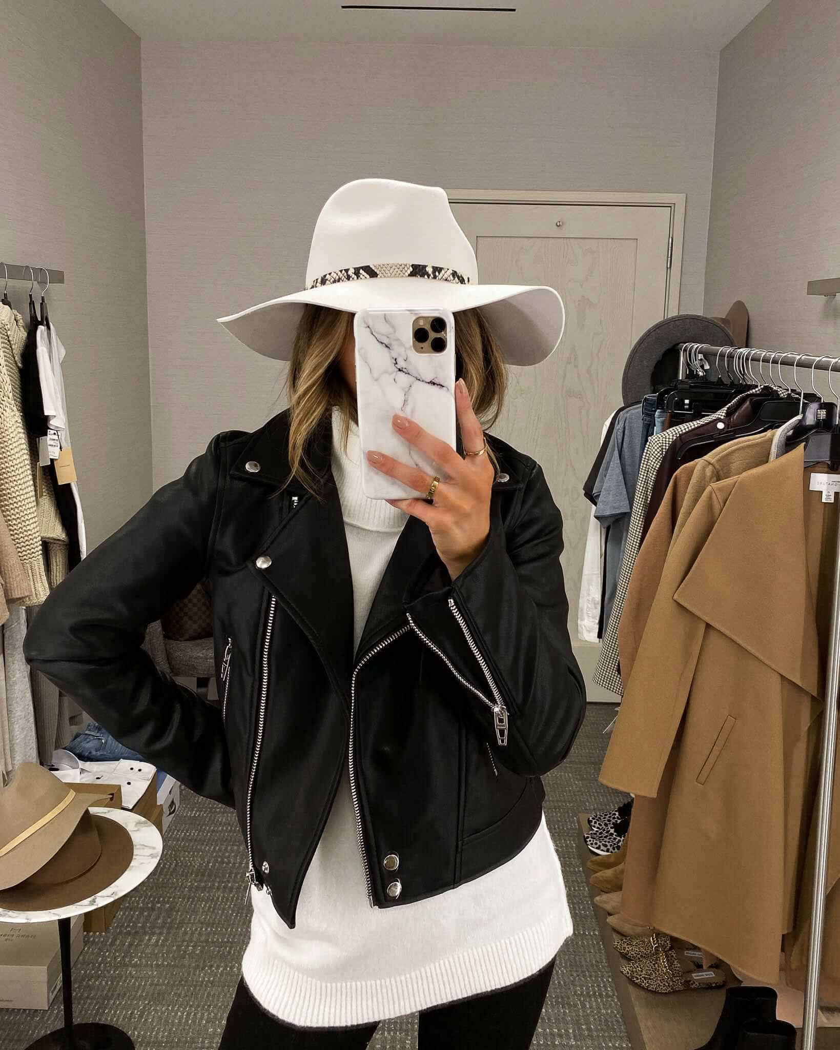 mia mia mine wearing a white rag & bone hat 