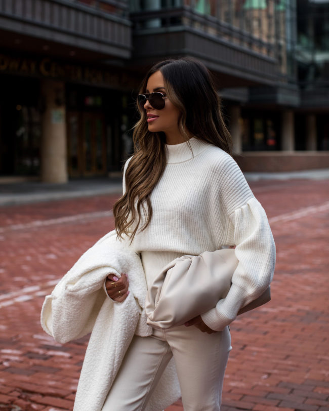 fashion blogger mia mia mine wearing an all white outfit for fall 2020