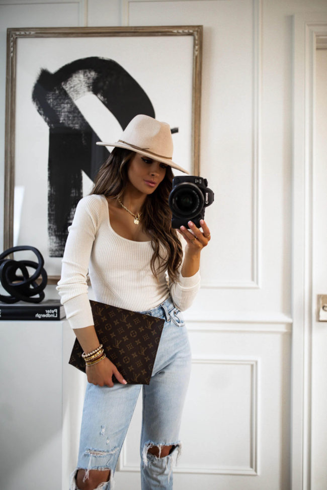 fashion blogger mia mia mine wearing an abercombie ivory bodysuit