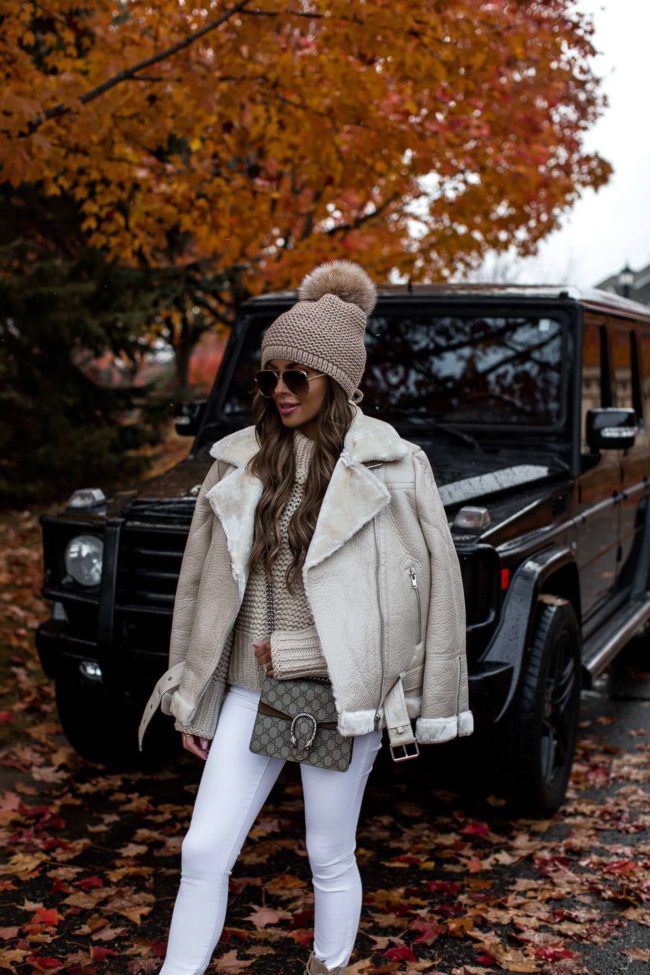 fashion blogger mia mia mine wearing a white biker jacket from nordstrom