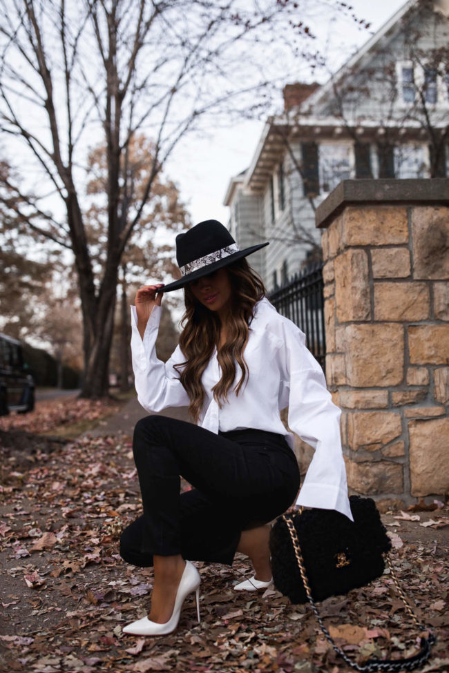 fashion blogger mia mia mine wearing a white button up shirt from verishop