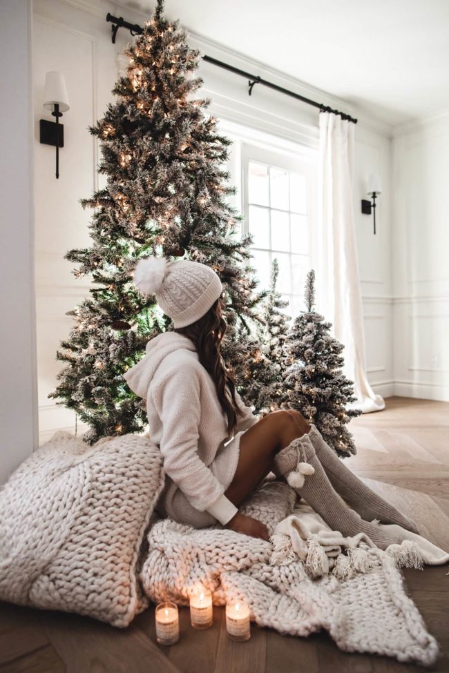 mia mia mine wearing sherpa pullover and pom pom beanie from nordstrom