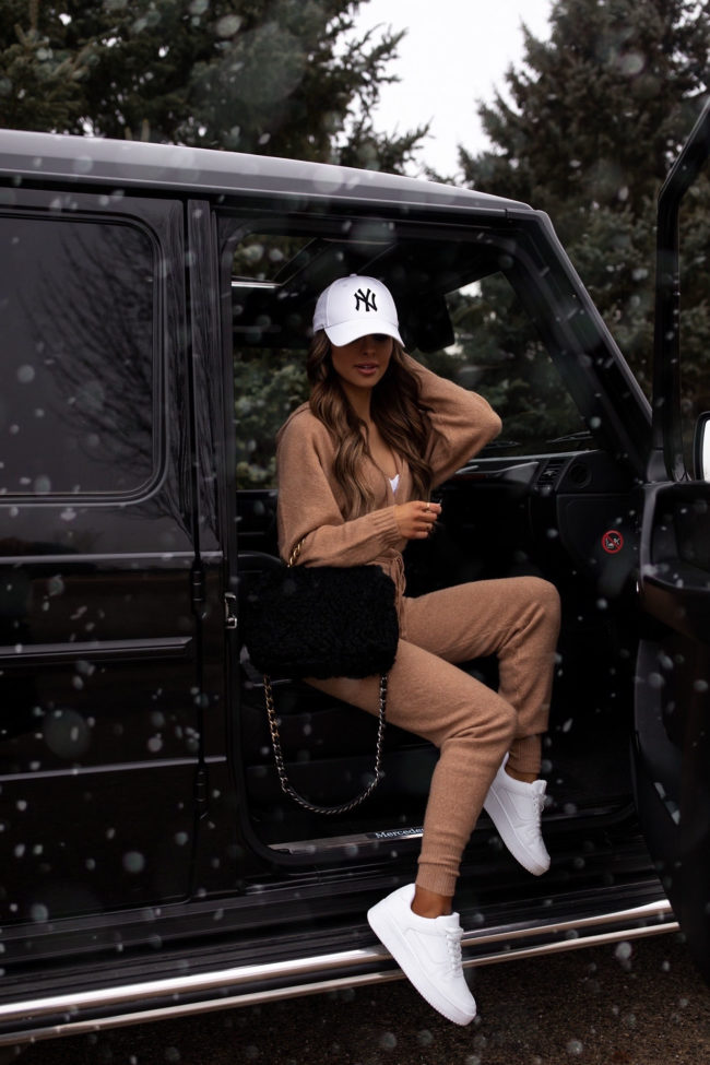 fashion blogger mia mia mine wearing a beige sweatsuit by sofia jeans