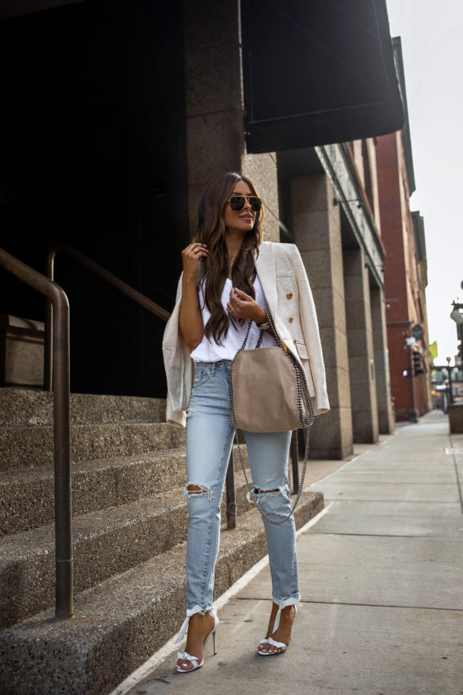 fashion blogger mia mia mine wearing a blazer and moussy denim from saks fifth avenue