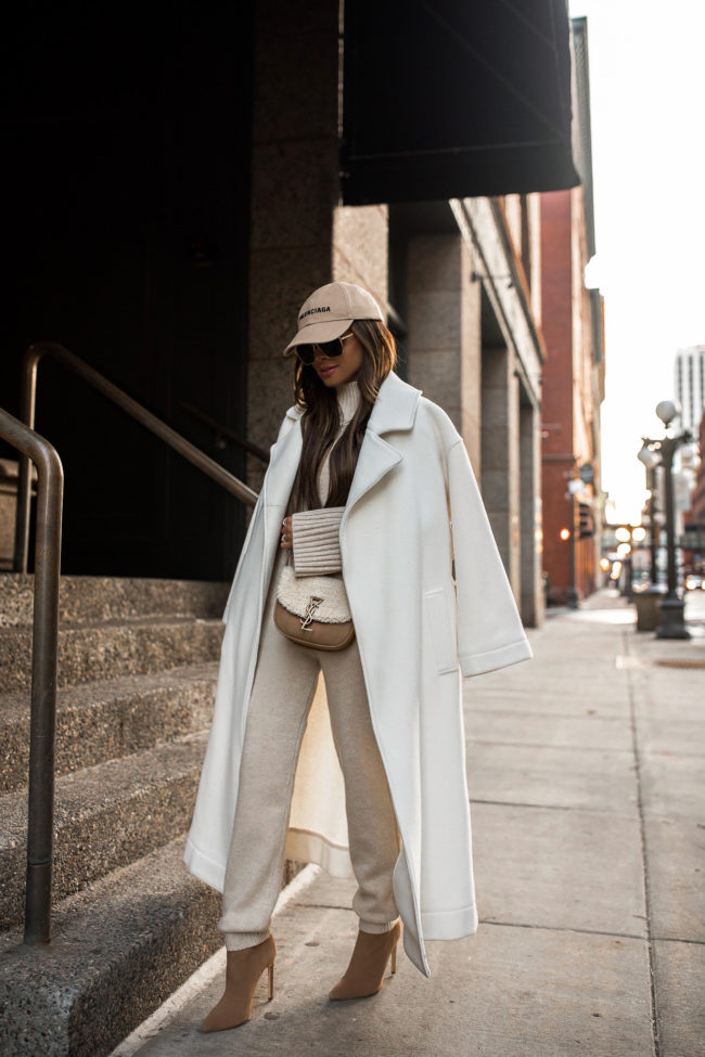 fashion blogger mia mia mine wearing a knit sweater set from revolve
