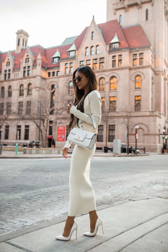 fashion blogger wearing a knit dress set from intermix