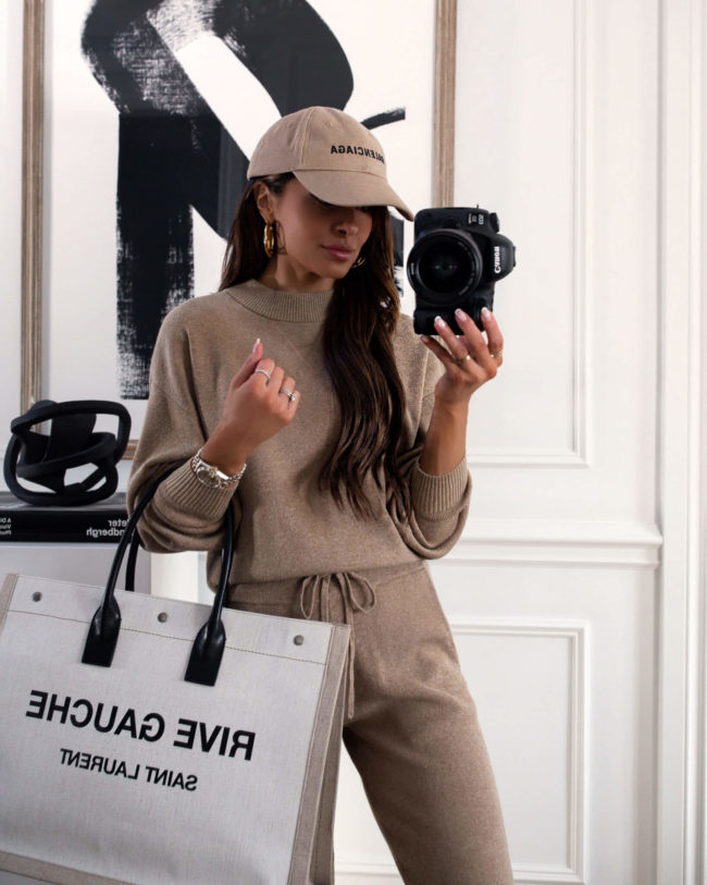 mia mia mine wearing a balenciaga cap and a knit set from abercrombie