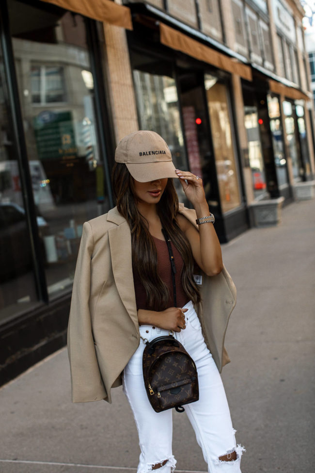fashion blogger mia mia mine wearing a camel blazer by anine bing camel blazer and a balenciaga cap