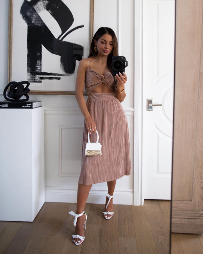 fashion blogger wearing a pink dress from forever 21