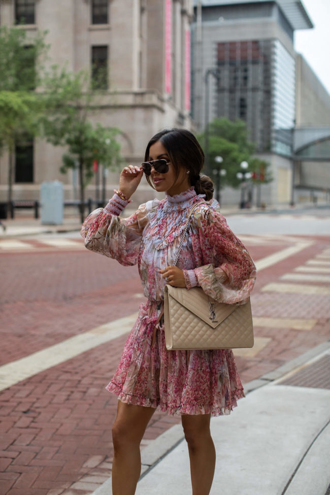 mia mia mine wearing a floral zimmerman dress from saks