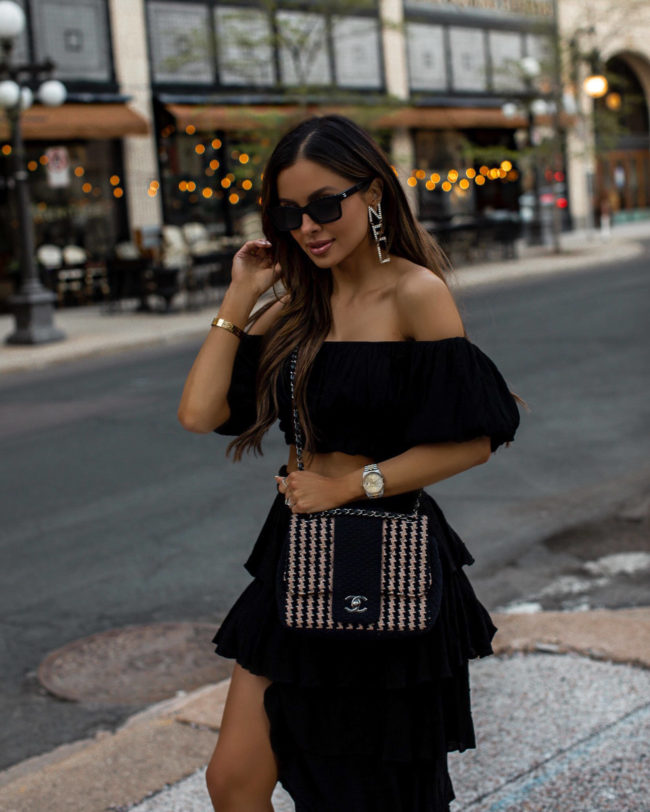 mia mia mine wearing a black summer set from revolve