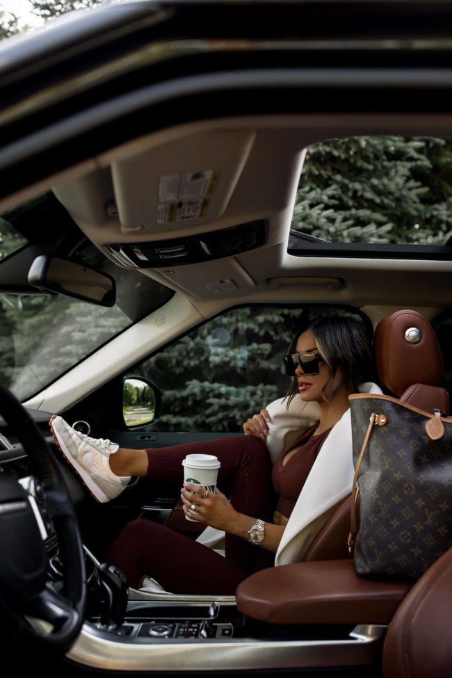 fashion blogger wearing a brown set from amazon and a white express coat for fall 2021