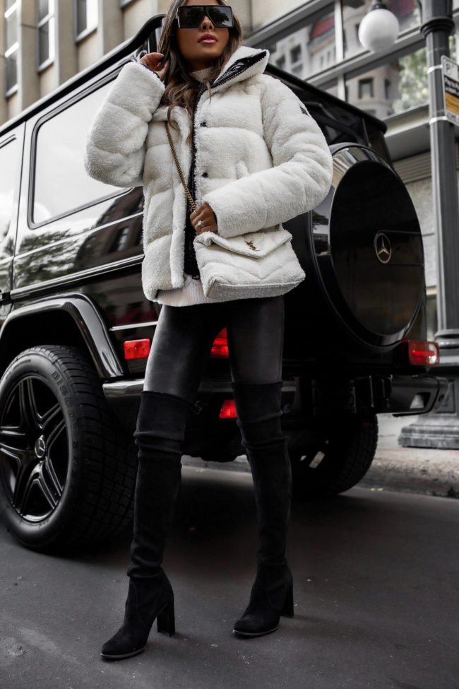 fashion blogger wearing stuart weitzman over the knee boots on sale at saks fifth avenue
