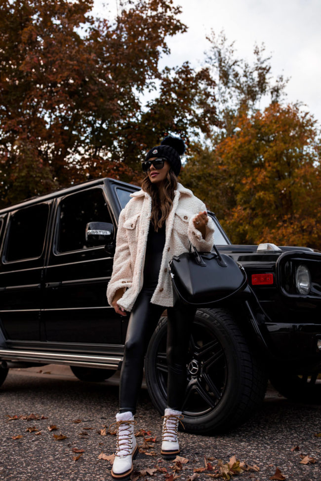 mia mia mine wearing white shearling lace up boots from nordstrom