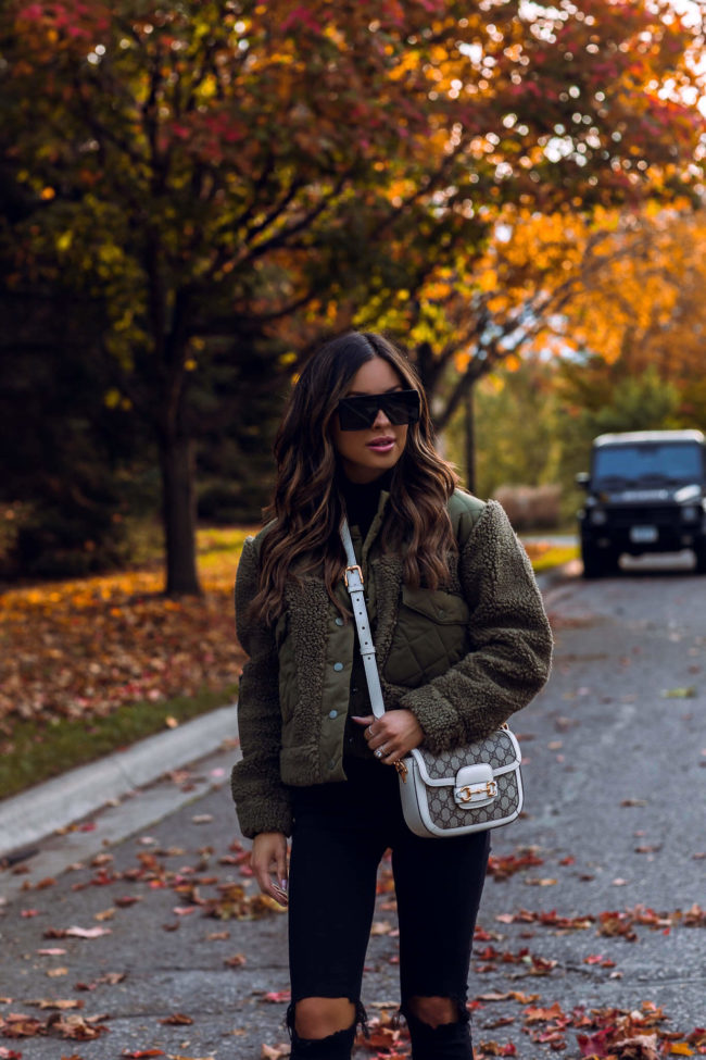fashion blogger wearing a gucci horsebit mini 1955 bag