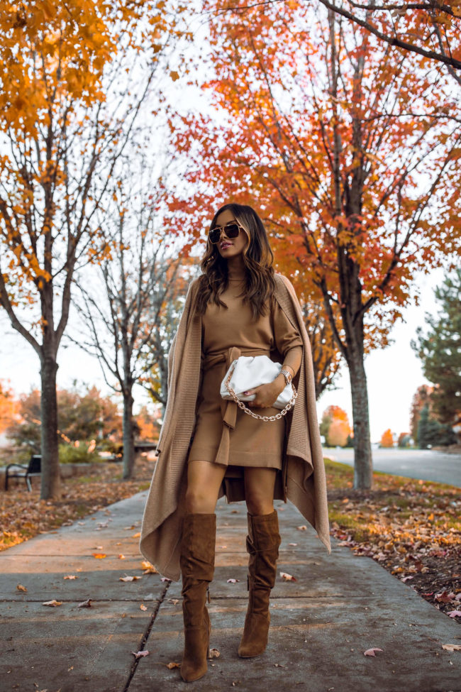 mia mia mine wearing a camel sweater dress and cardigan for fall