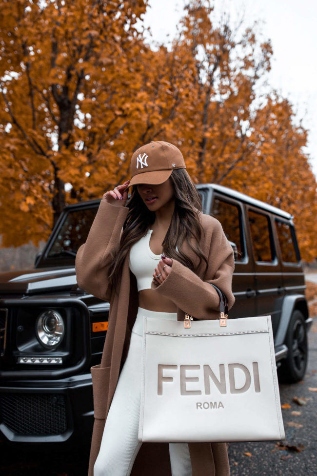 fashion blogger mia mia mine wearing a white knit set from amazon