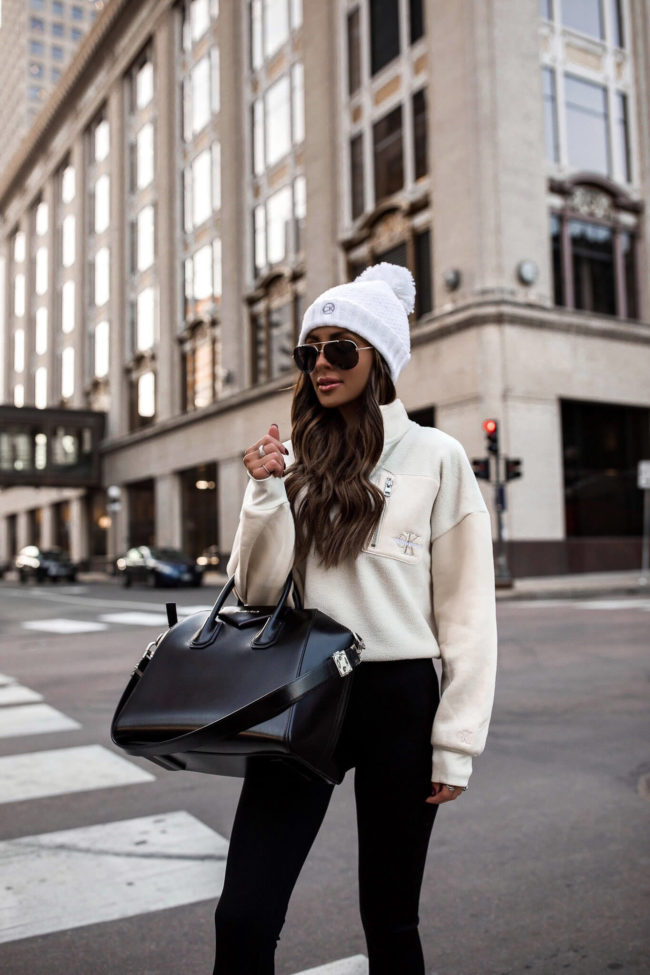 fashion blogger wearing a calvin klein fleece