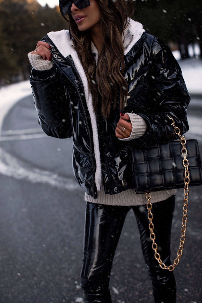 mia mia mine wearing a puffer jacket and faux leather leggings from walmart