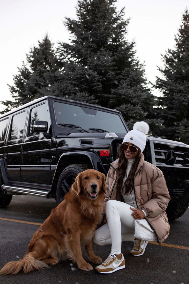 fashion blogger mia mia mine wearing a puffer jacket and nike daybreak sneakers from nordstrom