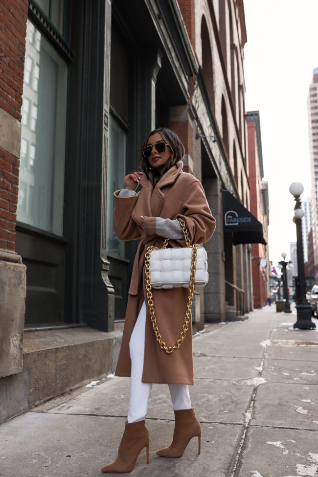mia mia mine wearing a camel coat from abercrombie