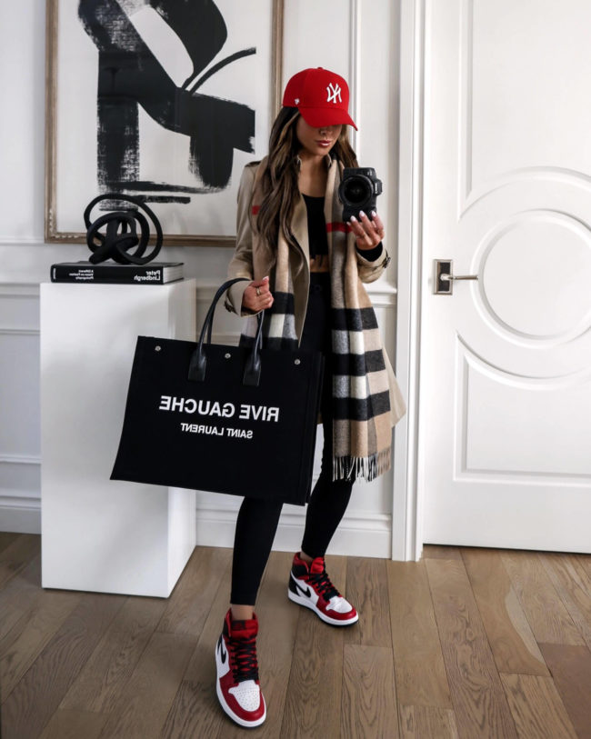 fashion blogger mia mia mine wearing a saint laurent rive gauche tote