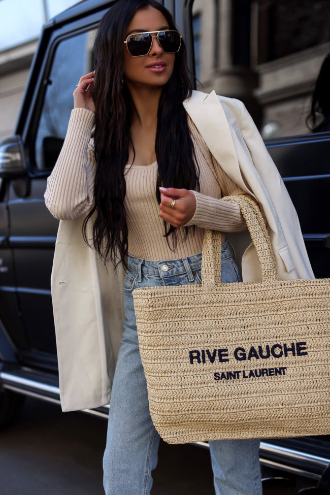 fashion blogger mia mia mine wearing a saint laurent crochet tote for summer 2022