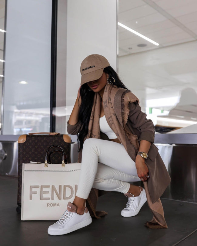 fashion blogger mia mia mine wearing a white knit set from amazon with white sneakers