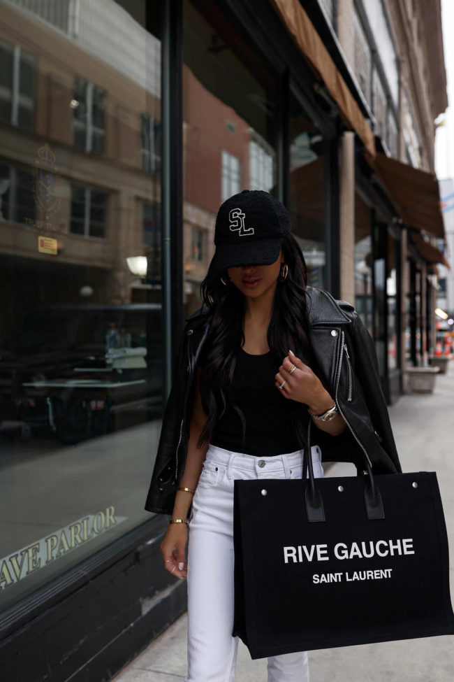 fashion blogger mia mia mine wearing a saint laurent tweed cap