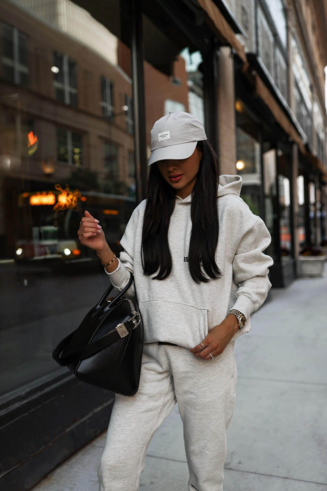 fashion blogger mia mia mine wearing a sweatsuit from ssense for fall
