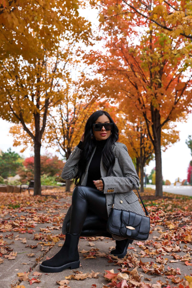 fashion blogger mia mia mine wearing a houndstooth blazer from walmart