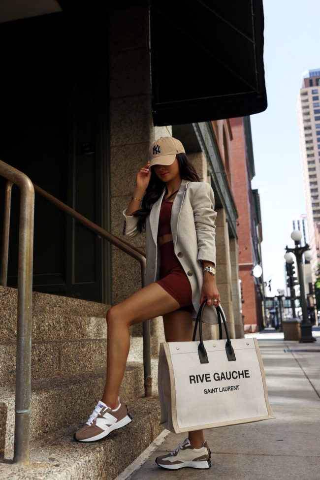 fashion blogger wearing an amazon workout set with new balance sneakers