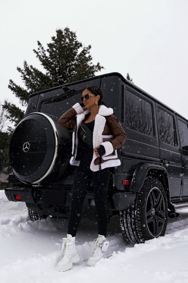 fashion blogger wearing a winter outfit from saks