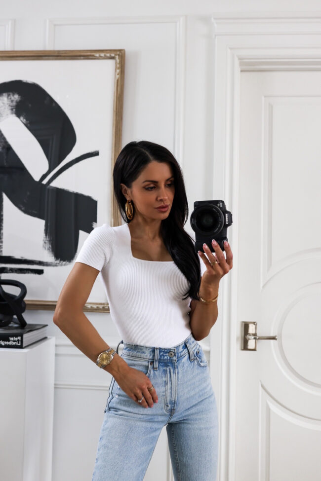 fashion blogger wearing a white bodysuit