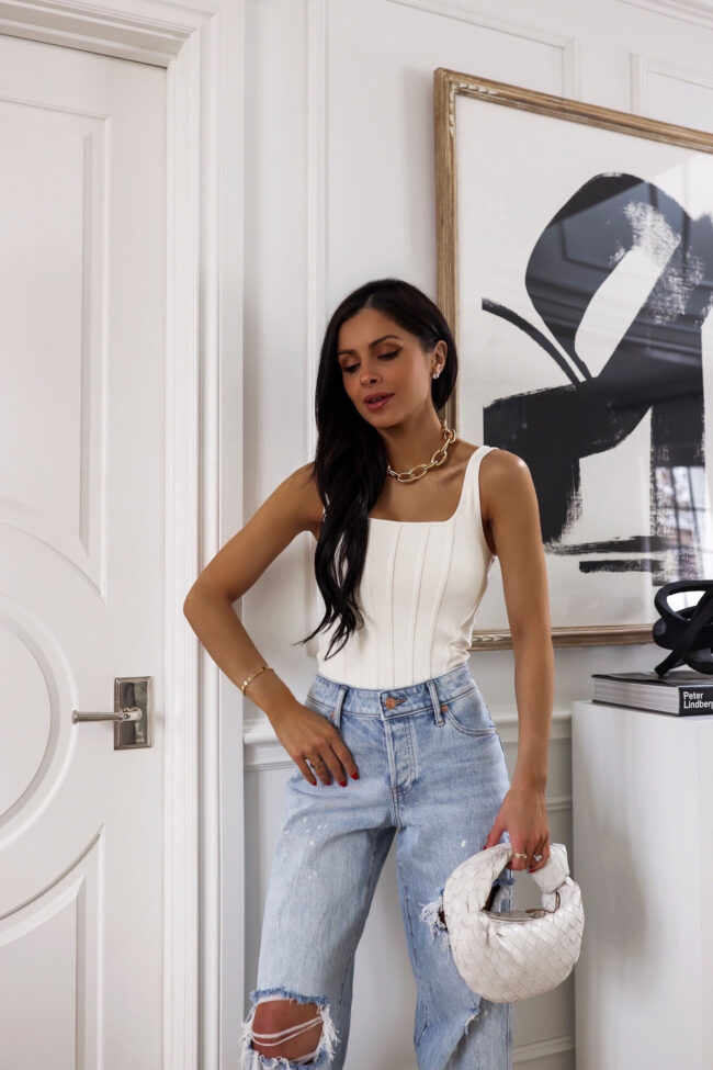 mia mia mine wearing a white corset top by express